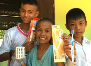 Burmese Learning Center children with new toothbrushes