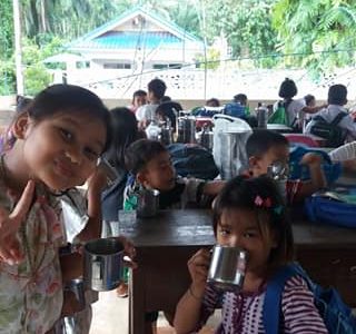 Students drinking soy milk at the Burmese Learning Center in Kuraburi