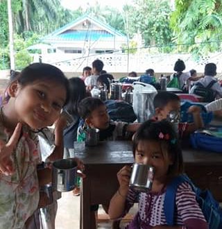 Students drinking soy milk at the Burmese Learning Center in Kuraburi